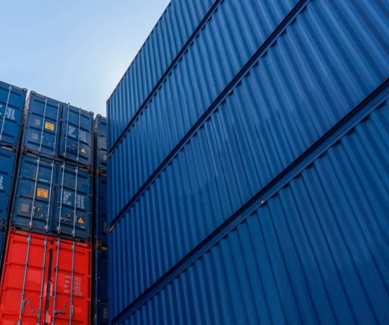 stack-of-blue-containers-box-cargo-freight-ship-for-import-export-logistics.jpg